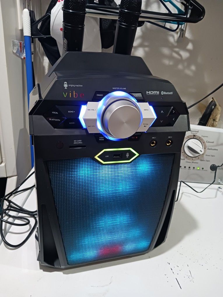 The Singing Machine VIBE HD - Def digital karaoke System. New. it comes with 2 microphones. usb. Bluetooth. hdmi .