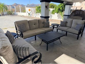 Outdoor sofa and loveseats with matching tables