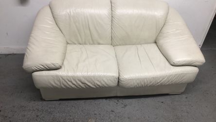 Real leather beige color love seat sofa very good condition