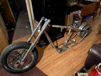 Oh too wide glide front end triple trees legs front rim and tire the frame is separate
