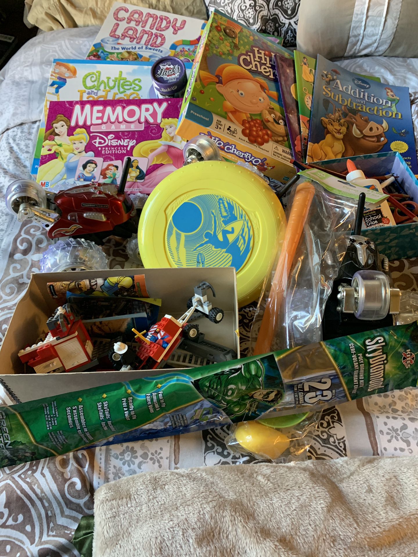 Miscellaneous kids board games and toys. Small set of Legos. Games are in excellent condition.