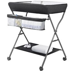 STILL IN BOX. Portable baby changing table