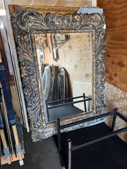 Ornate artist design golden solid wood  bevelled mirror 46 x 62.. $300