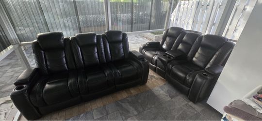 Black Faux Leather Reclining Sofa and Loveseat Set with Cup Holders