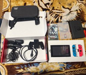 Switch v2 with 2 games plus accessories