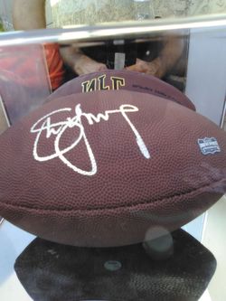 Autographed football from football quarterback Steve Young