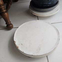 Two 2.5"x12" 
wood plants holders on wheels 