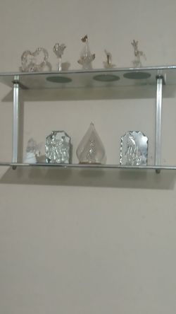 Glass shelf with glass figurines $60