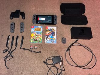 Like-New Nintendo Switch Bundle + 4 Joy-Cons, Case & 4 Top Games!