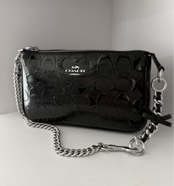 Coach bag with bow extender included