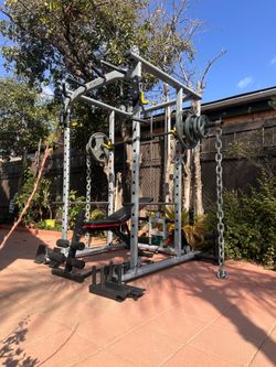OLYMPIC SQUAT RACK WITH OLYMPIC WEIGHTS AND BENCH