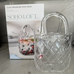 Soho Loft glass purse beverage set with a straw.