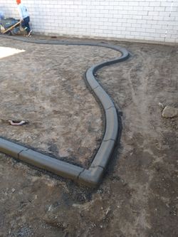Concrete curbing sprinklers and sod