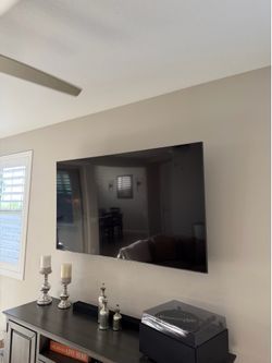 70 inch Samsung TV with sound bar and bass