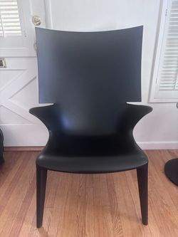 TWO  Kartell uncle Jim chairs