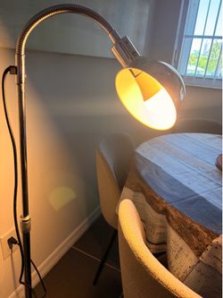 Chrome floor lamp with adjustable  neck
