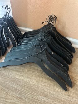 Free Assorted Wooden Clothes Hangers