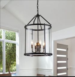 EDISLIVE Ellisonn Industrial 4-Light Black Lantern Geometric Chandelier with Water

Grained Glass Shade.