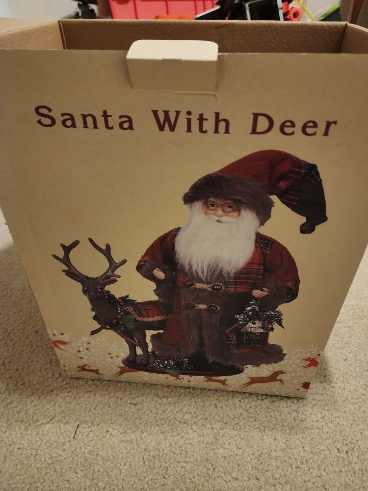 Large Santa With Deer Statue