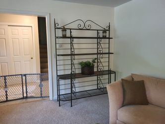 Metal baker’s rack shelving unit.
