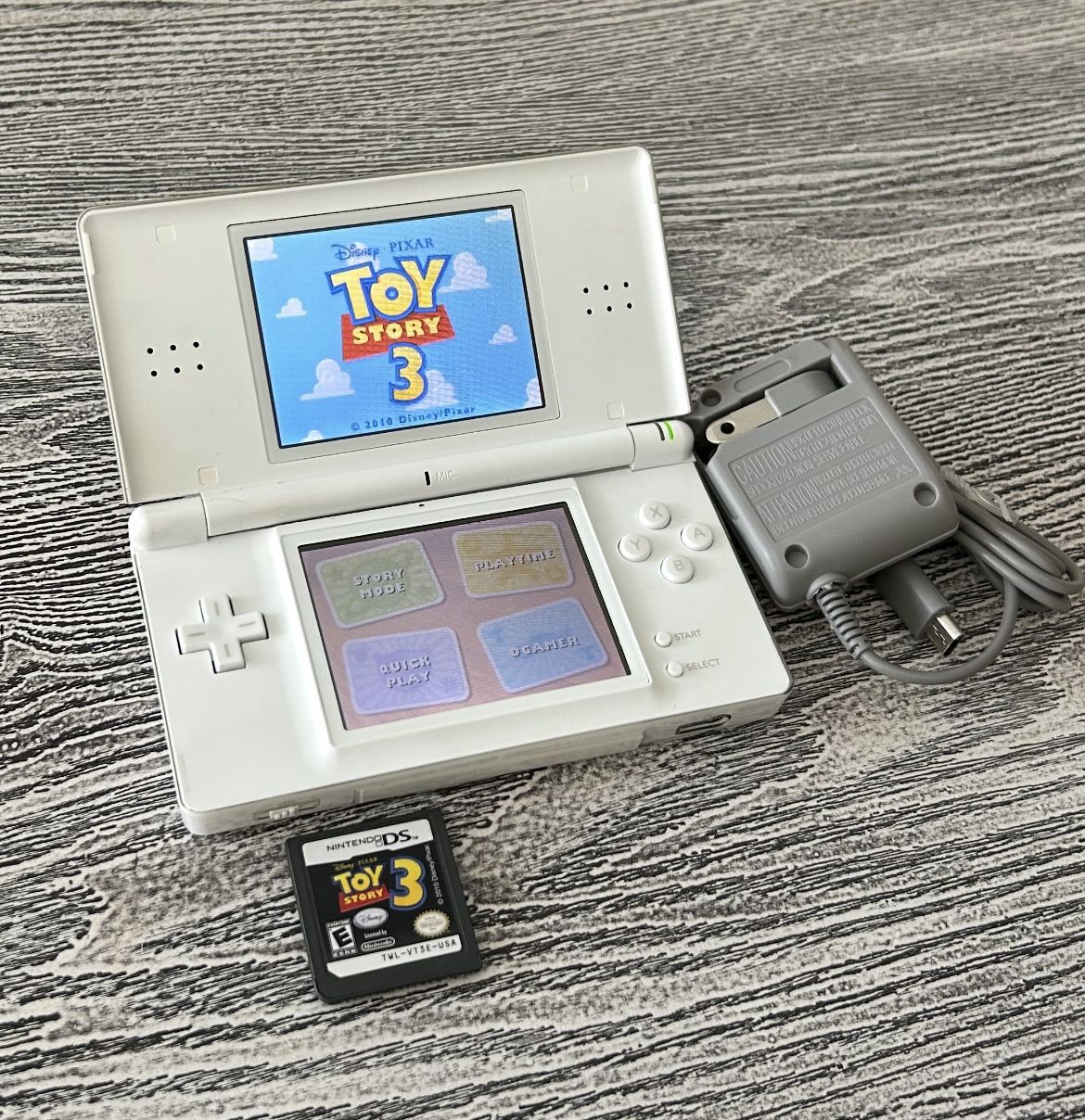 Nintendo DS with a game, complete with stylus & charger- Low Price. $30