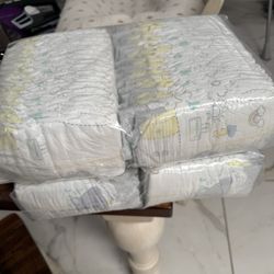 Two Sleeves Of Size 1 Pampers 