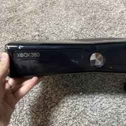xbox 360 with games and power cord 