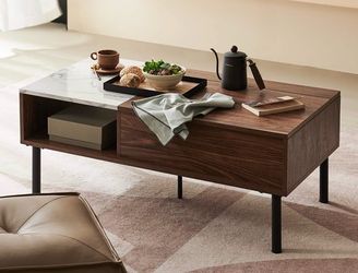 Coffee table with hidden storage