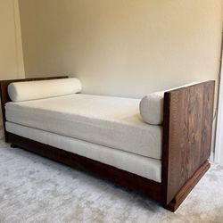 Hand-crafted wood and bouclé daybed