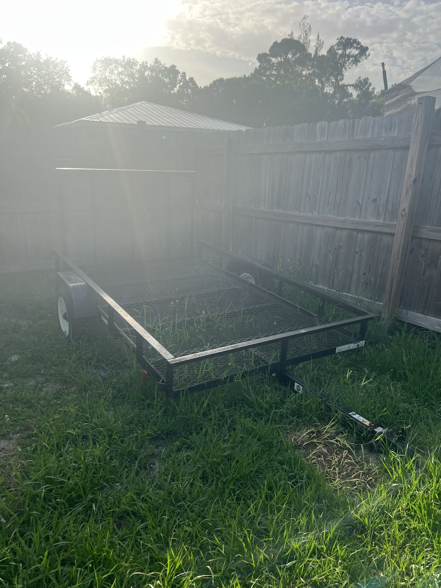 Lowe’s black metal trailer 5x8