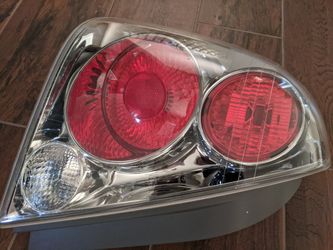 2005 Nissan Altima driver side stock tail light