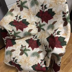 Christmas tablecloth, size 120x80 inches, and 4 new placemats, all for $15.