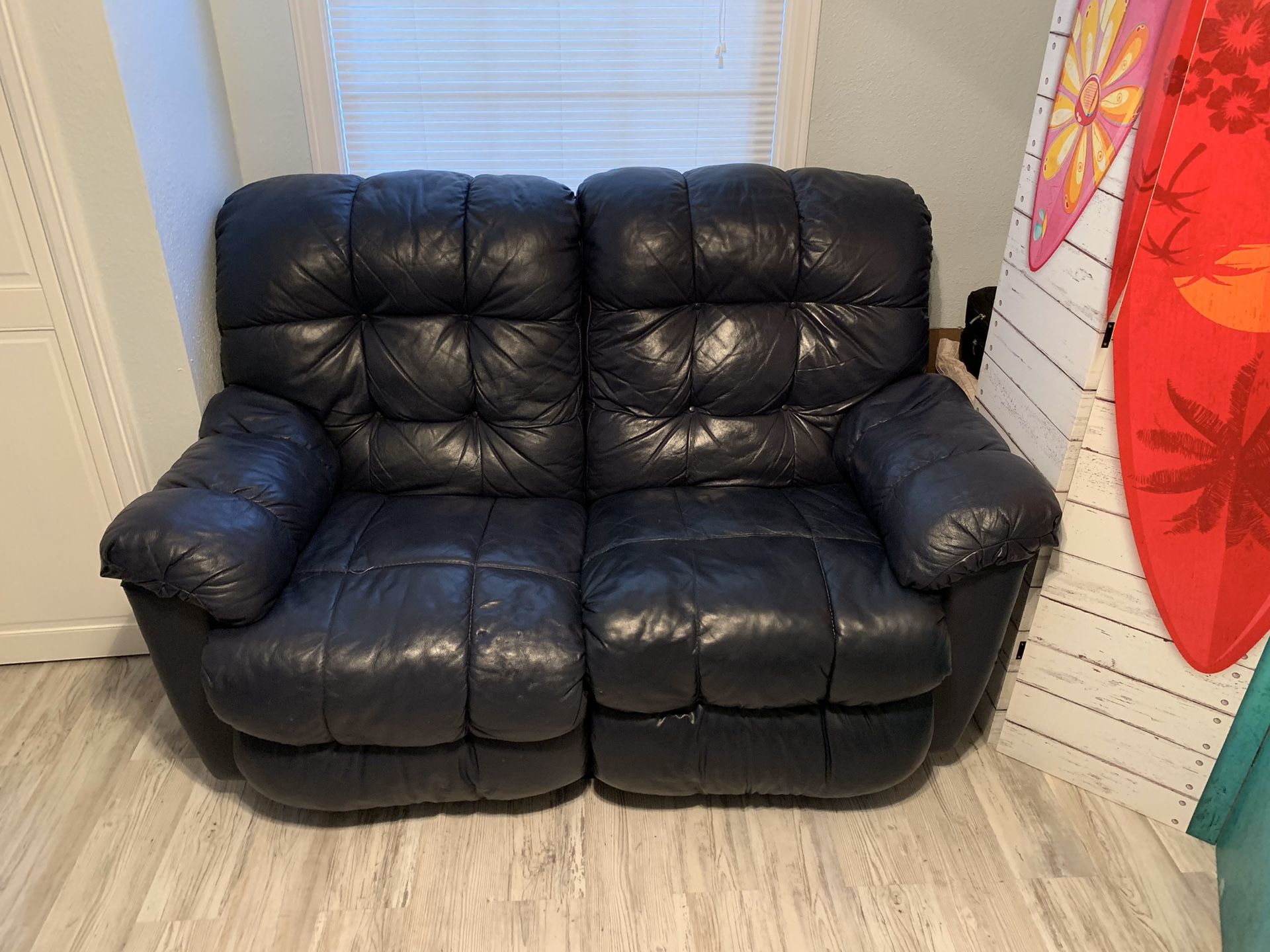 Faux leather reclining love seat