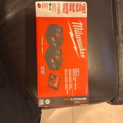 Two Milwaukee M18 Red Lithium XC5.0  Battery With Charger