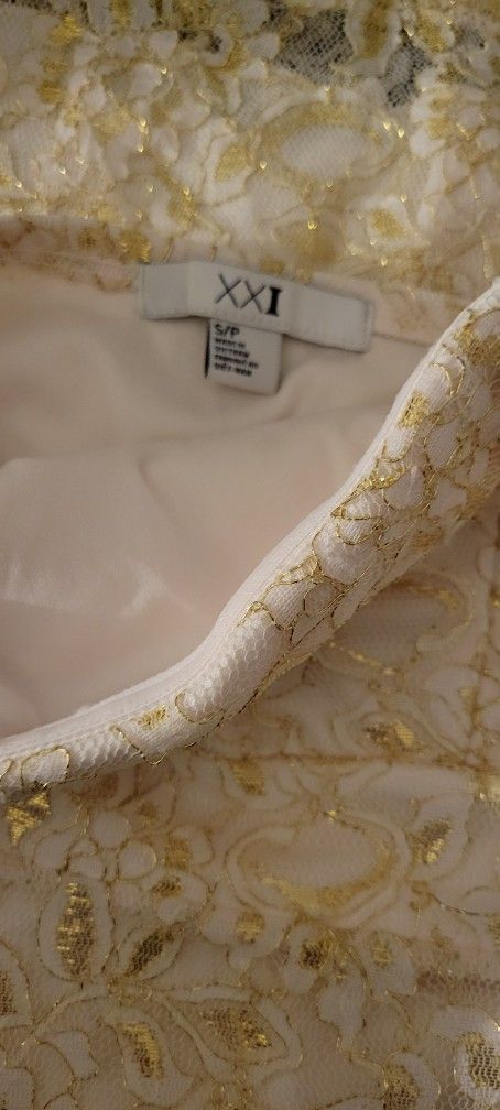 White dress with gold embroidery