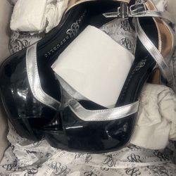 Women’s high heel size 6, and black