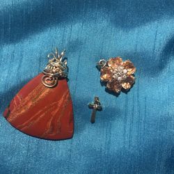 Assorted pendants: flower, striped carnelian with silver twist, mini gold cross JEWELRY & Pendants