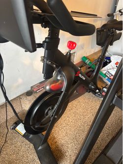 Peloton Bike with Screen + Cycling Shoes (size 7) – Excellent Condition