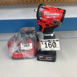 Milwaukee Cordless Impact Wrench Model 2562-20 With 2 Batteries And A Charger 