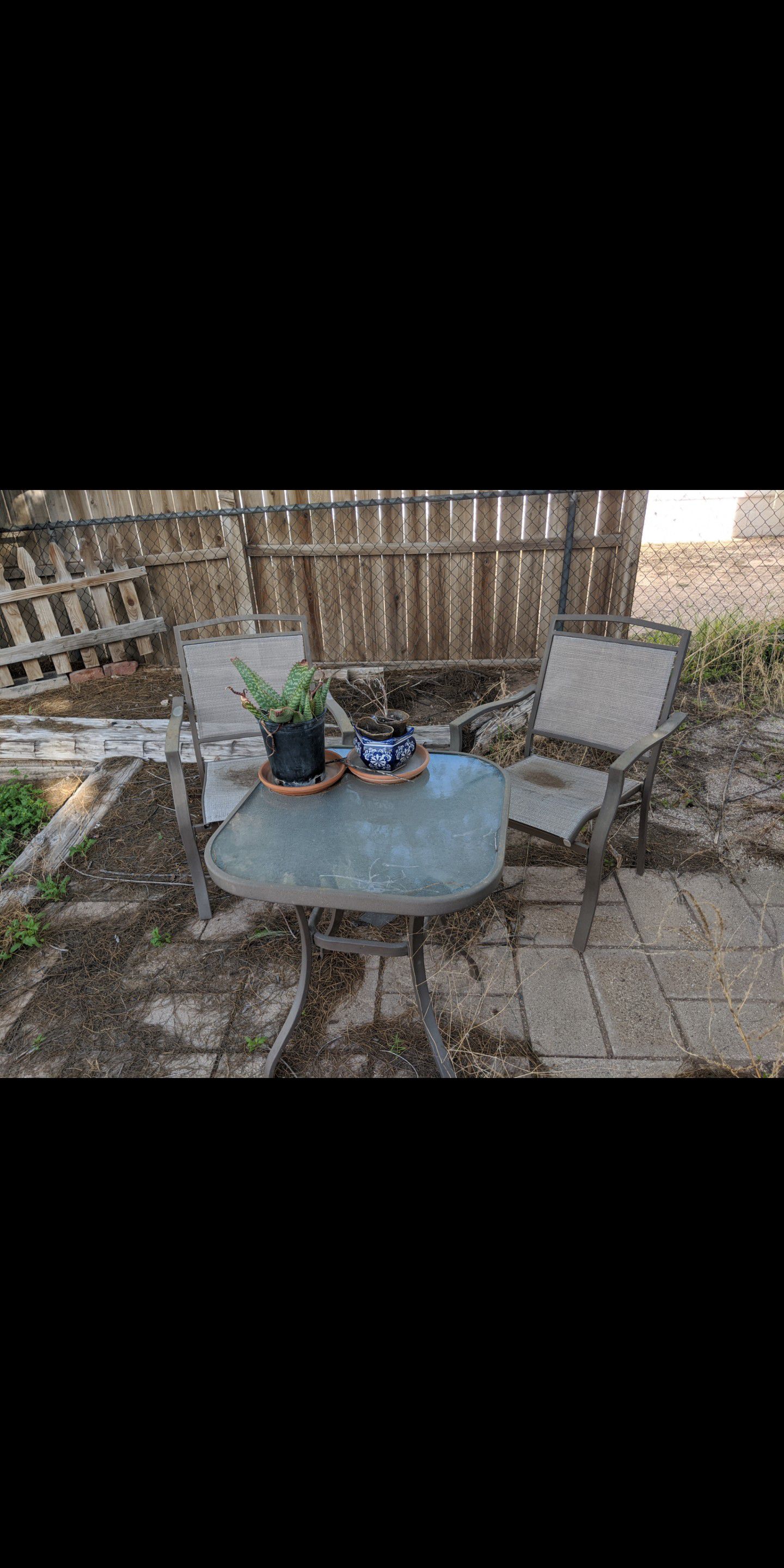 Outside table and 2 chairs