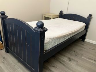 Twin wooden bed and dresser