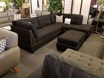 Brand new 104" x 75" black linen reversible sectional + ottoman