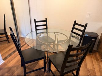 Round glass top dining table set with 4 chairs