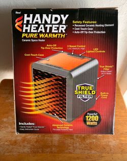 BRAND NEW HANDY HEATER SEALED IN BOX 