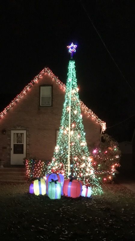 20 ft Christmas mega tree with 8 ft base ring