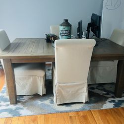 Table, chairs, and carpet 