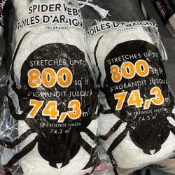 Two Bags Of Spider Webs 