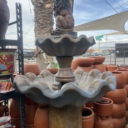 Concrete water fountain have the ring on the bottom part