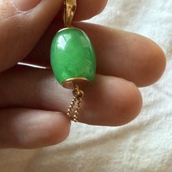 Beautiful, vintage barrel shaped natural Jade pendant with 18 karat gold findings