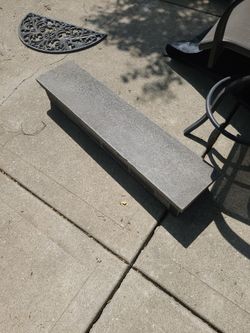 A metal patio Step